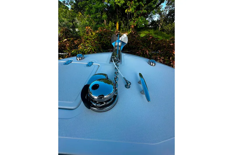 Slide: The Image of 2021 Wellcraft 262 Fisherman boat deck with anchor and chrome fittings. - 13