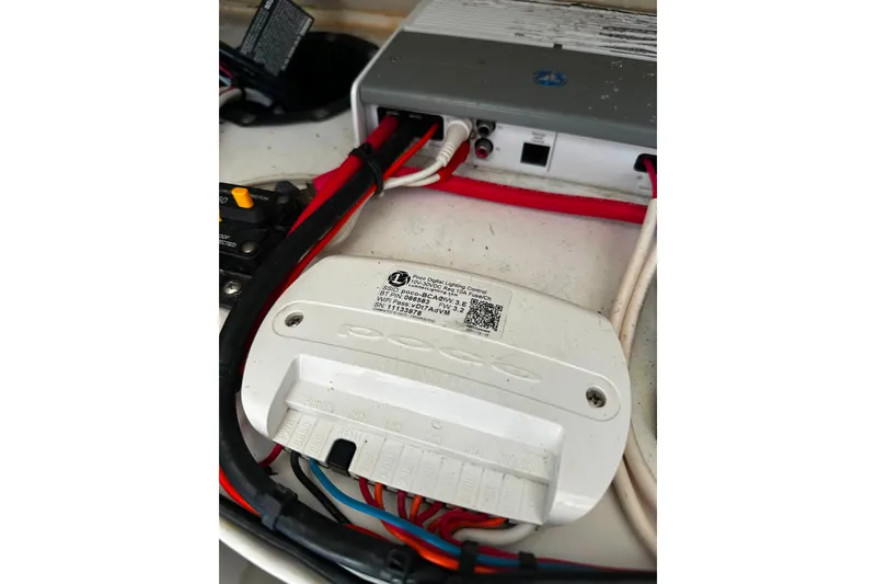 Slide: The Image of Electrical wiring and components inside a 2021 Wellcraft 262 Fisherman boat. - 23