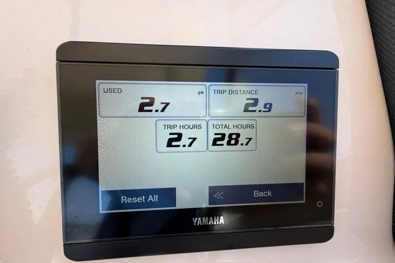 Slide: The Image of Yamaha display showing trip data: 2.7 gallons used, 2.9 miles distance, 2.7 trip hours. - 20