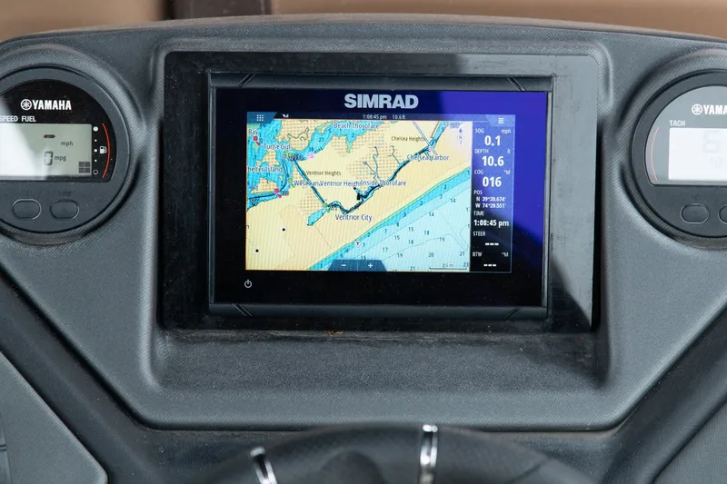 Slide: The Image of Dashboard of 2023 Sylvan L5 DLZ Bar with Simrad navigation display and Yamaha gauges. - 4