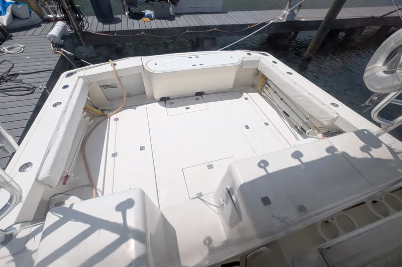 Slide: The Image of 2005 Rampage 38 Express boat deck, spacious and well-equipped for fishing or leisure activities. - 14