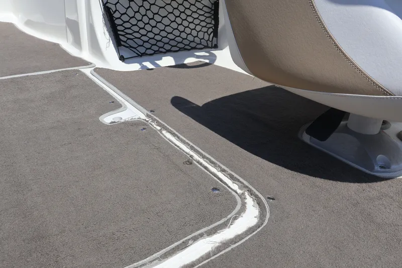 Slide: The Image of Interior of 2012 Larson LX 2150 boat showing seating and flooring details. - 40