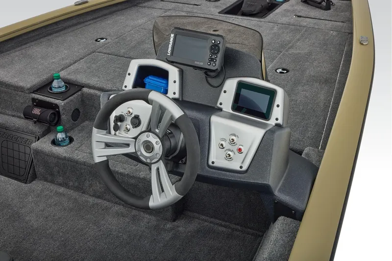 Slide: The Image of Manufacturer Provided Image: 2026 Tracker Pro Team 195 boat dashboard with steering wheel and electronic controls. - 38
