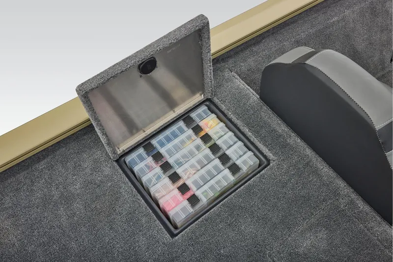 Slide: The Image of Manufacturer Provided Image: Storage compartment with organized tackle boxes in 2026 Tracker Pro Team 195 boat. - 49