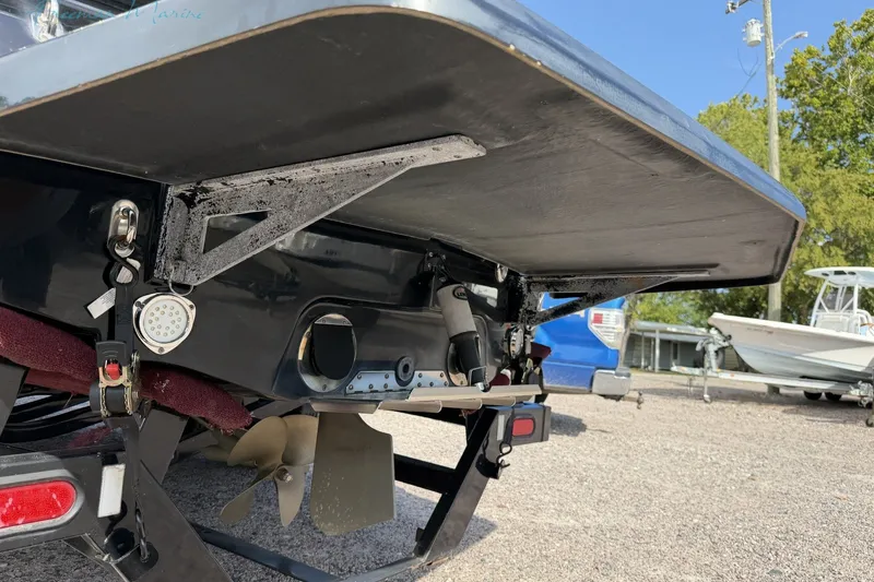 Slide: The Image of 2011 MasterCraft X-35 boat underside with propeller and trailer details. - 7