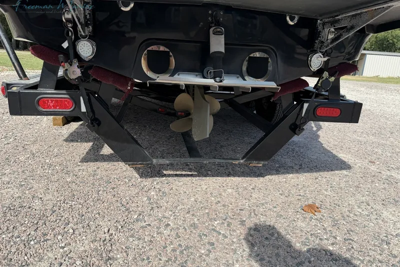 Slide: The Image of Rear view of a 2011 MasterCraft X-35 boat on a trailer. - 5