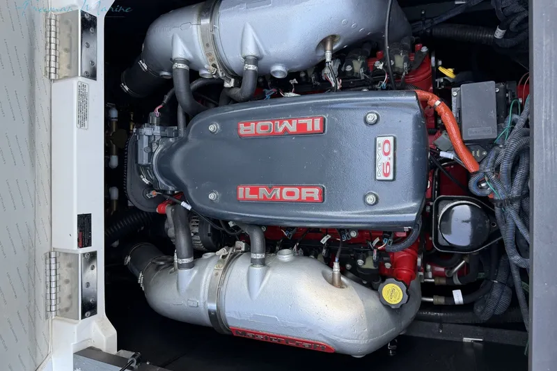 Slide: The Image of Engine of a 2011 MasterCraft X-35 boat, featuring Ilmor MV8 6.0 components. - 16