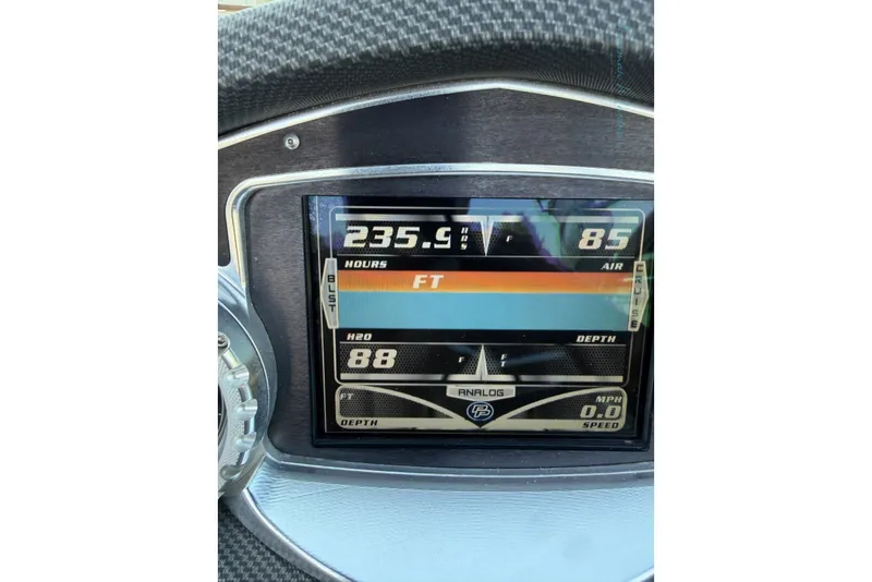 Slide: The Image of Dashboard of a 2011 MasterCraft X-35 boat displaying various metrics and controls. - 40