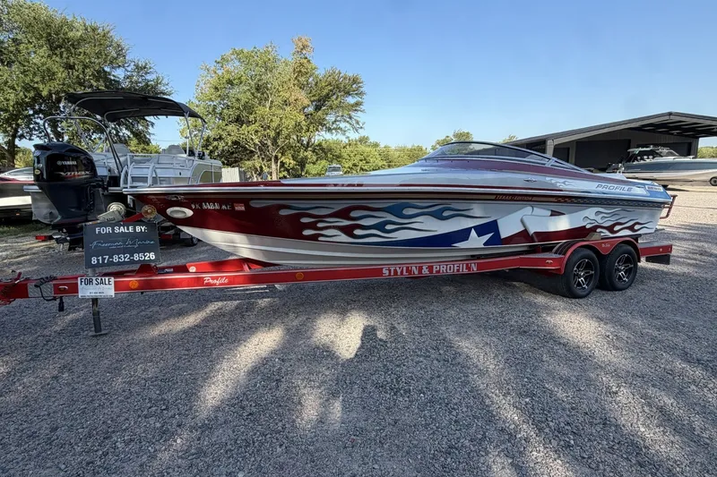 Slide: The Image of Red and white 2006 Profile 260 V boat with Texas flag design, for sale. - 34