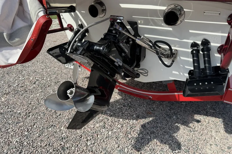 Slide: The Image of Rear view of a 2006 Profile 260 V boat with a MerCruiser outdrive. - 3