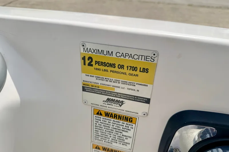 Slide: The Image of Capacity label on 2008 Starcraft 2000 IO Limited boat, max 12 persons or 1700 lbs. - 41
