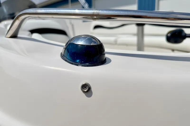 Slide: The Image of Close-up of a 2008 Starcraft 2000 IO Limited boat's navigation light. - 70