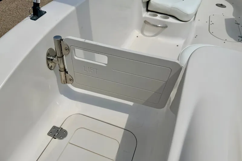 Slide: The Image of 2008 Starcraft 2000 IO Limited boat interior with lift gate and seating. - 26