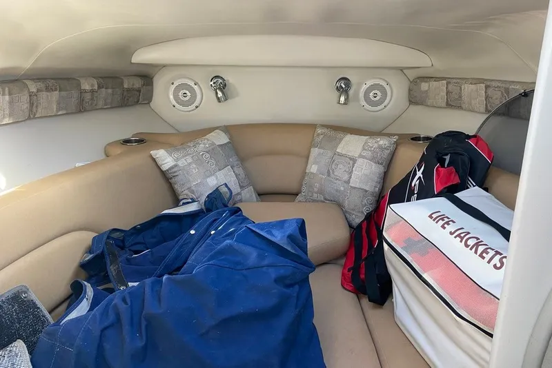 Slide: The Image of Interior of 2012 Crownline 236 SC boat with cushions and life jackets. - 20