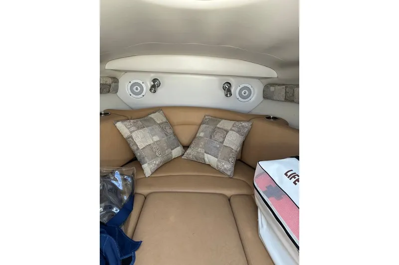 Slide: The Image of Interior cabin of 2012 Crownline 236 SC boat with cushions and life jacket. - 43
