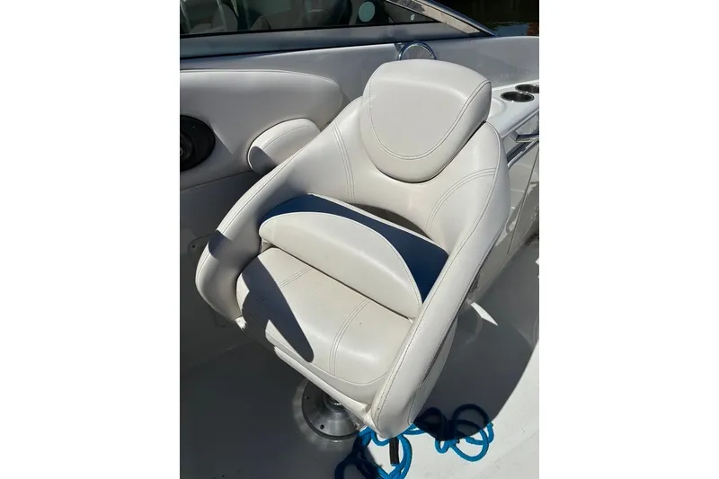 Slide: The Image of White leather seat on 2012 Crownline 236 SC boat, featuring modern design and comfort. - 49