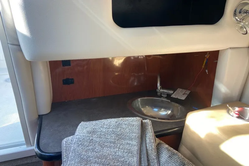 Slide: The Image of Interior of 2012 Crownline 236 SC boat with sink and countertop. - 23