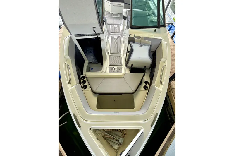 Slide: The Image of 2023 Cobalt R6 Surf boat interior with seating and storage compartments. - 37