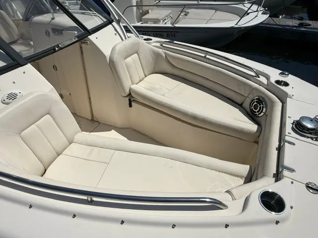 Slide: The Image of The 2015 Grady-White Freedom 255 features a spacious, cushioned seating area in the bow. - 3