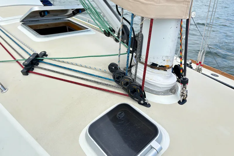 Slide: The Image of Deck of 2000 J Boats J/120 sailboat with ropes and pulleys. - 10