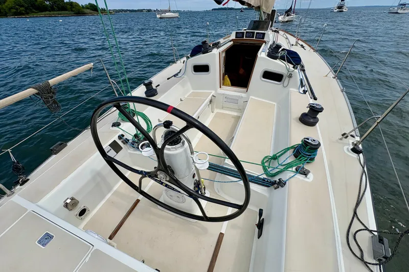Slide: The Image of Cockpit view of 2000 J Boats J/120 sailboat on water. - 3