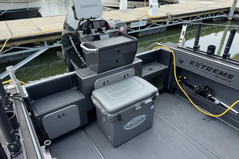 Slide: The Image of 2022 Extreme Boats 745 Walk Around interior with Garmin equipment and Icy-Tek cooler. - 9
