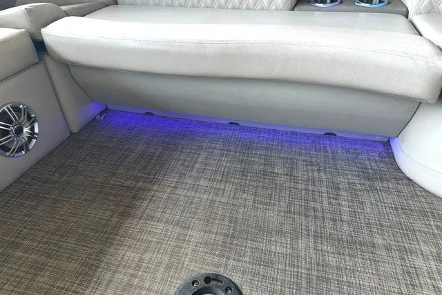 Slide: The Image of Luxurious interior of 2019 Harris Sunliner 240 with ambient blue LED lighting. - 24