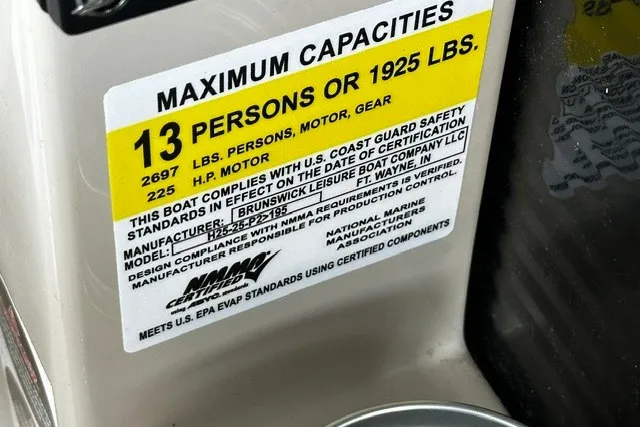 Slide: The Image of Label on 2019 Harris Sunliner 240 showing maximum capacity of 13 persons or 1925 lbs. - 23