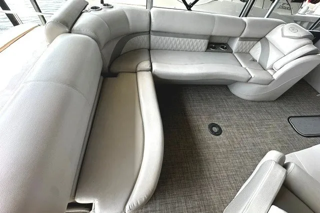 Slide: The Image of Luxurious seating area on a 2019 Harris Sunliner 240 pontoon boat with gray upholstery. - 15