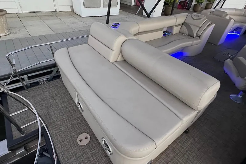Slide: The Image of Luxurious seating on 2019 Harris Sunliner 240 pontoon boat with ambient lighting. - 31