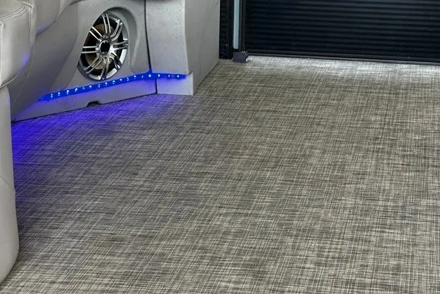 Slide: The Image of Interior of 2019 Harris Sunliner 240 with speaker and blue LED lighting. - 25