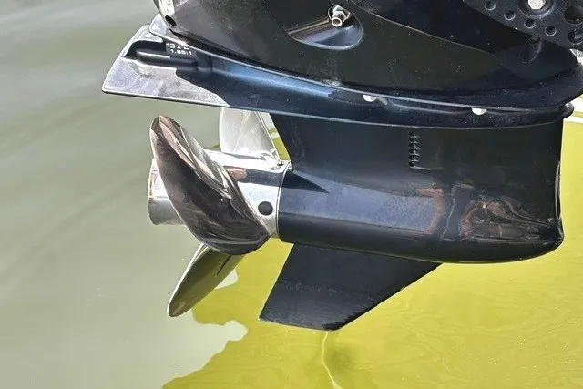 Slide: The Image of Close-up of a 2019 Harris Sunliner 240 boat propeller in water. - 21