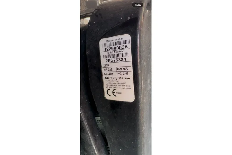 Slide: The Image of Label on Mercury Marine engine, model 12250005A, serial 2B575384, 225 HP, for Harris Sunliner 240. - 34