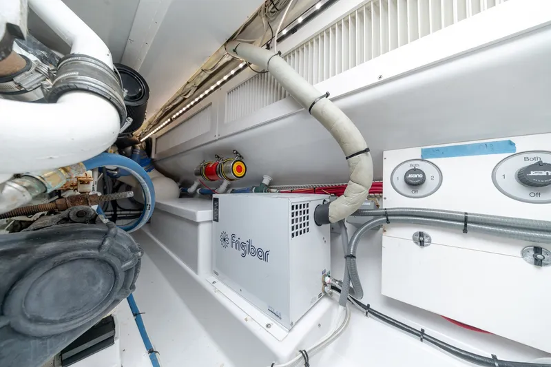 Slide: The Image of Engine room of 2010 Jamie Chadwick 61' Convertible with Frigibar unit and control panels. - 43