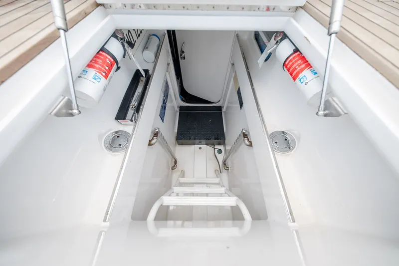 Slide: The Image of Interior view of a 2010 Jamie Chadwick 61' Convertible yacht, featuring a ladder and safety equipment. - 34