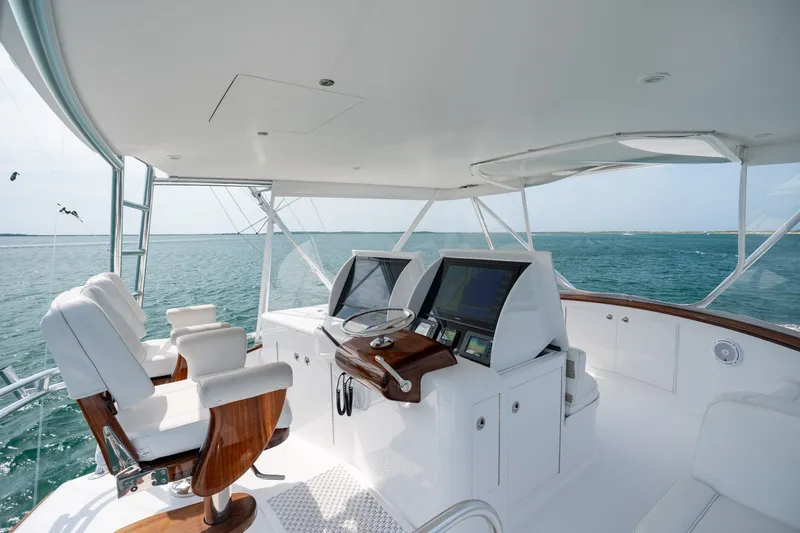Slide: The Image of Luxurious helm of a 2010 Jamie Chadwick 61' Convertible yacht with ocean view. - 59