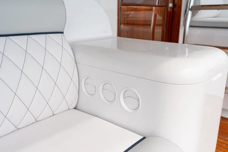 Slide: The Image of Luxurious white leather seating on a 2010 Jamie Chadwick 61' Convertible yacht interior. - 29