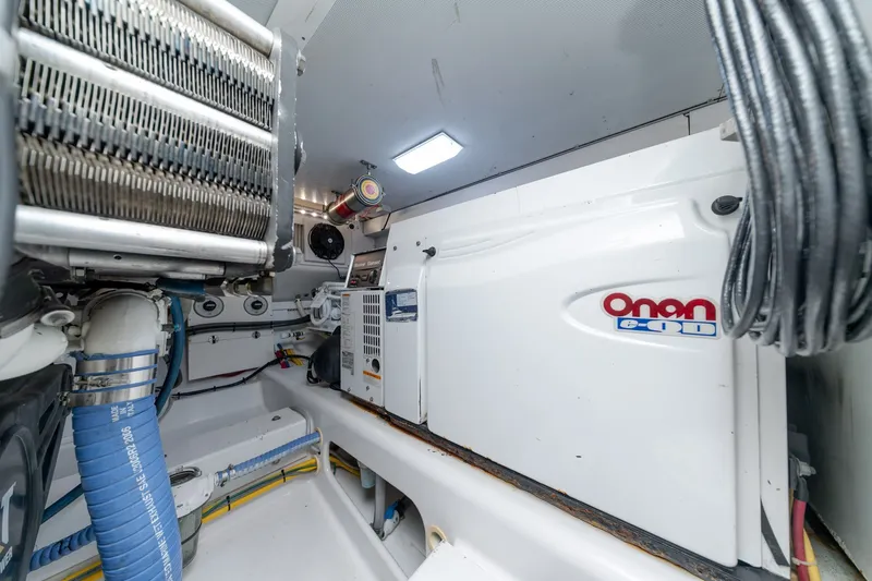 Slide: The Image of Engine room of a 2010 Jamie Chadwick 61' Convertible with Onan generator. - 38