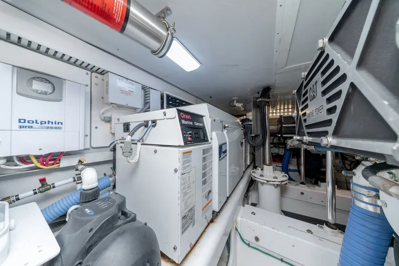 Slide: The Image of Engine room of a 2010 Jamie Chadwick 61' Convertible yacht with marine generator and equipment. - 45
