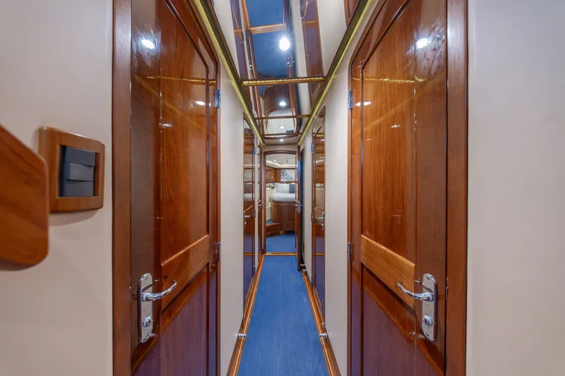 Slide: The Image of Luxurious wooden hallway interior of 2010 Jamie Chadwick 61' Convertible yacht. - 81