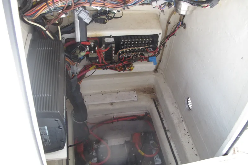 Slide: The Image of Electrical wiring and components inside a 2018 Pathfinder 2500 Hybrid boat. - 25