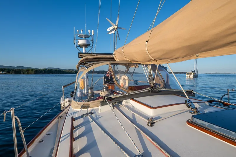 Slide: The Image of Sailboat on calm water, Able 42 model, 1990, with clear blue sky. - 14