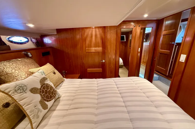 Slide: The Image of Luxurious cabin interior of 2007 Navigator 44 Classic yacht with elegant wood finish. - 32
