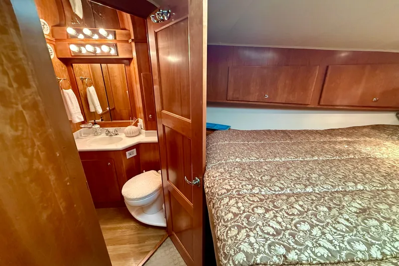 Slide: The Image of 2007 Navigator 44 Classic yacht interior with cozy bedroom and elegant bathroom. - 39