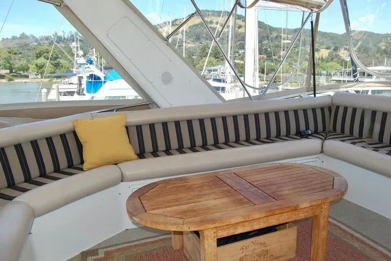Slide: The Image of Luxurious seating area on 2007 Navigator 44 Classic yacht with scenic marina view. - 38
