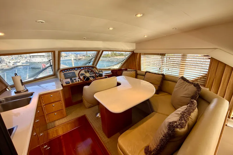 Slide: The Image of Luxurious interior of 2007 Navigator 44 Classic yacht with plush seating and helm station. - 15