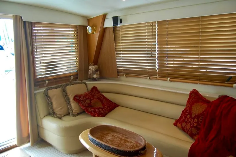 Slide: The Image of Luxurious interior of 2007 Navigator 44 Classic yacht with plush seating and wooden blinds. - 12