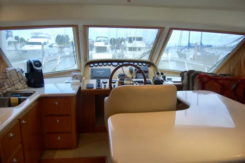 Slide: The Image of Interior view of 2007 Navigator 44 Classic yacht helm with panoramic windows. - 13