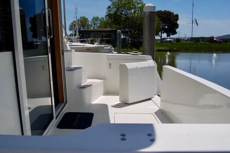 Slide: The Image of 2007 Navigator 44 Classic yacht deck with steps and water view. - 5