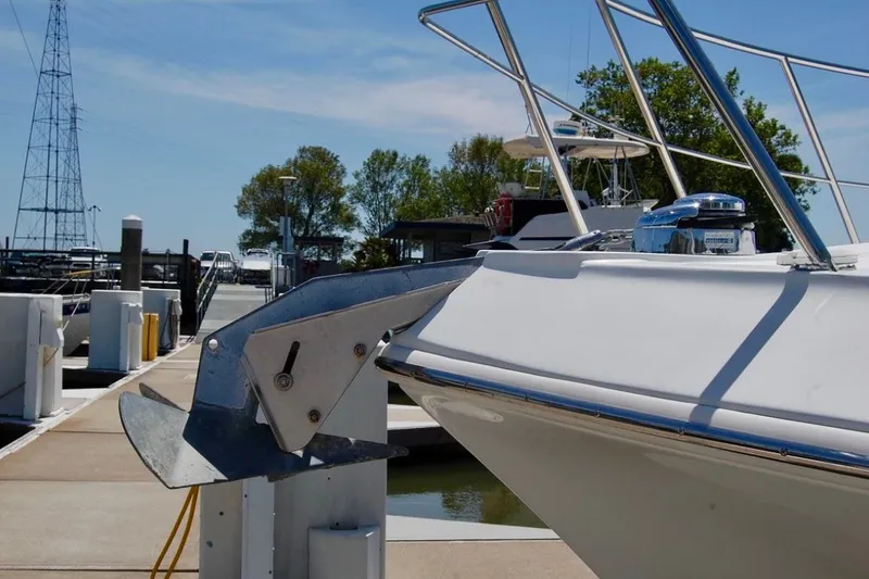 Slide: The Image of Bow of 2007 Navigator 44 Classic yacht with anchor at marina dock. - 45